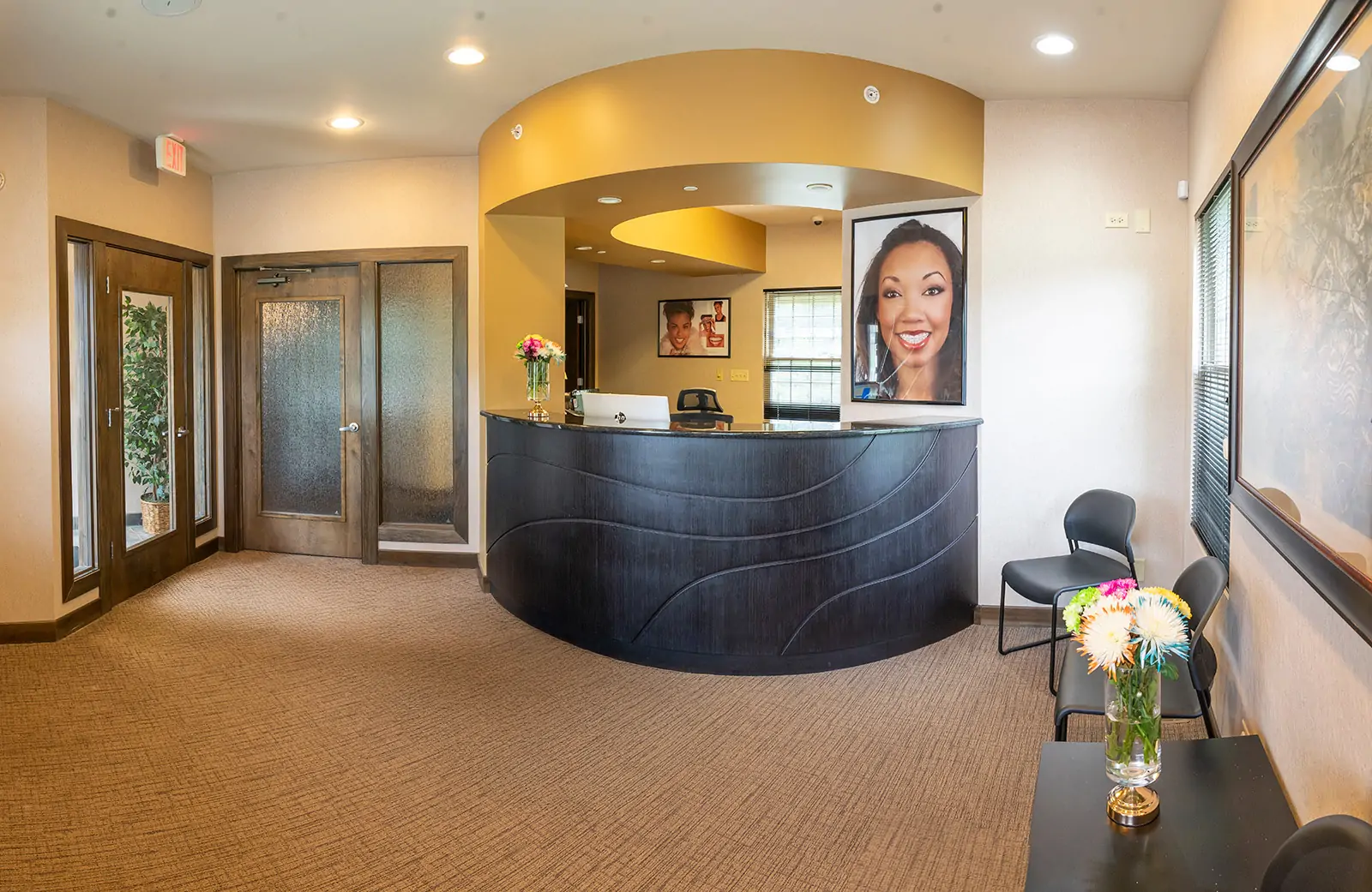 Modern reception area with seating.